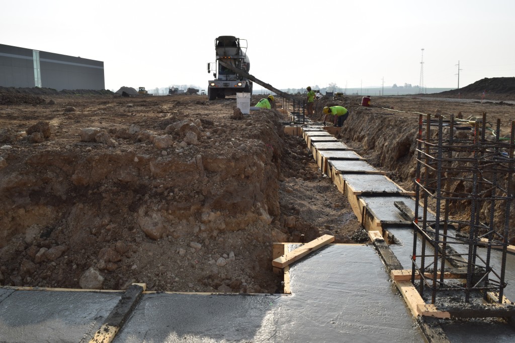 5-12-22: Pouring cement footings