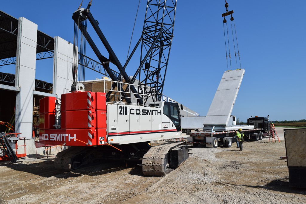 8-10-22: Precast panels are delivered and unloaded for the east side of our building