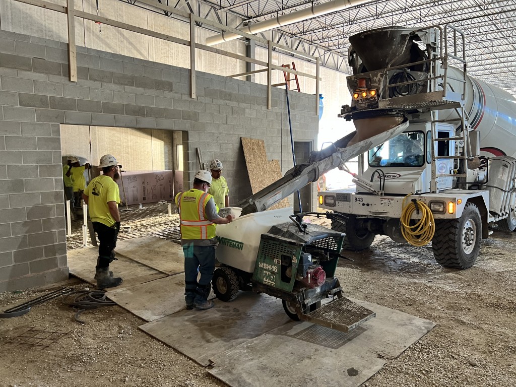 8-31-22: Pouring concrete in the new plant restroom