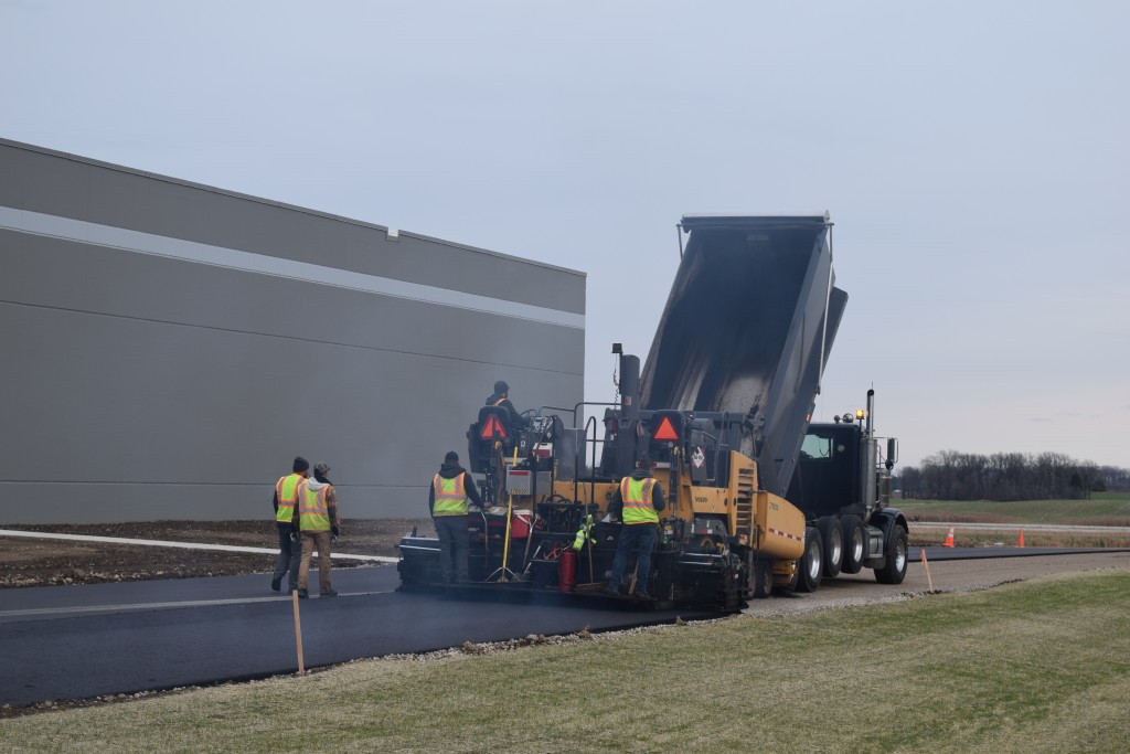 11-14-22: An asphalt driveway is added to connect the east and west dock areas