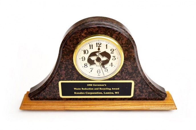 clock with plaque reading 1998 Governor's Waste Reduction and Recycling Award