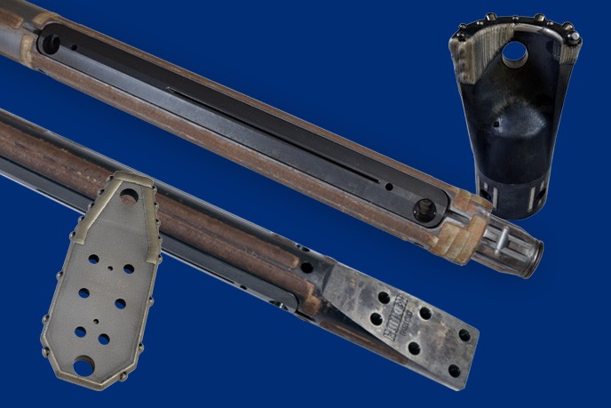 A flat bit and a sonde housing