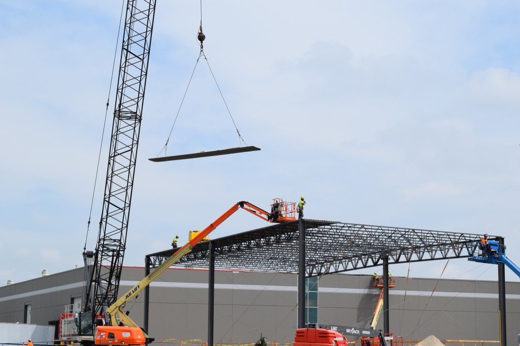 7-7-22: Roof decking is lifted and attached 