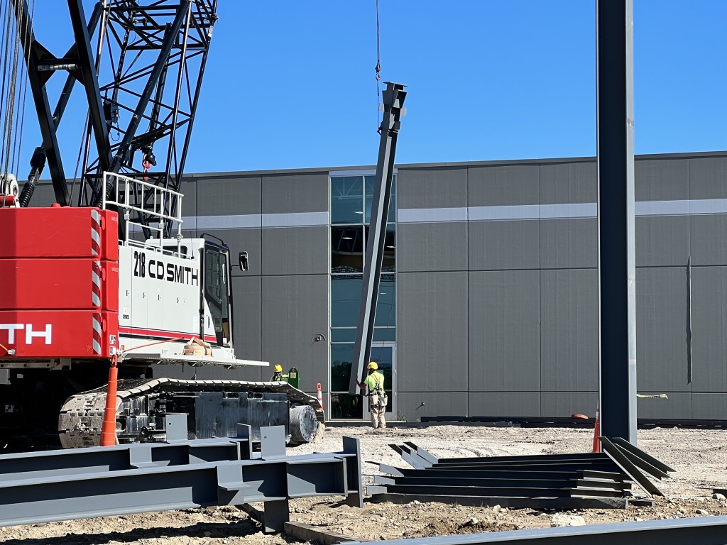 7-28-22: Additional structural steel columns are set in place
