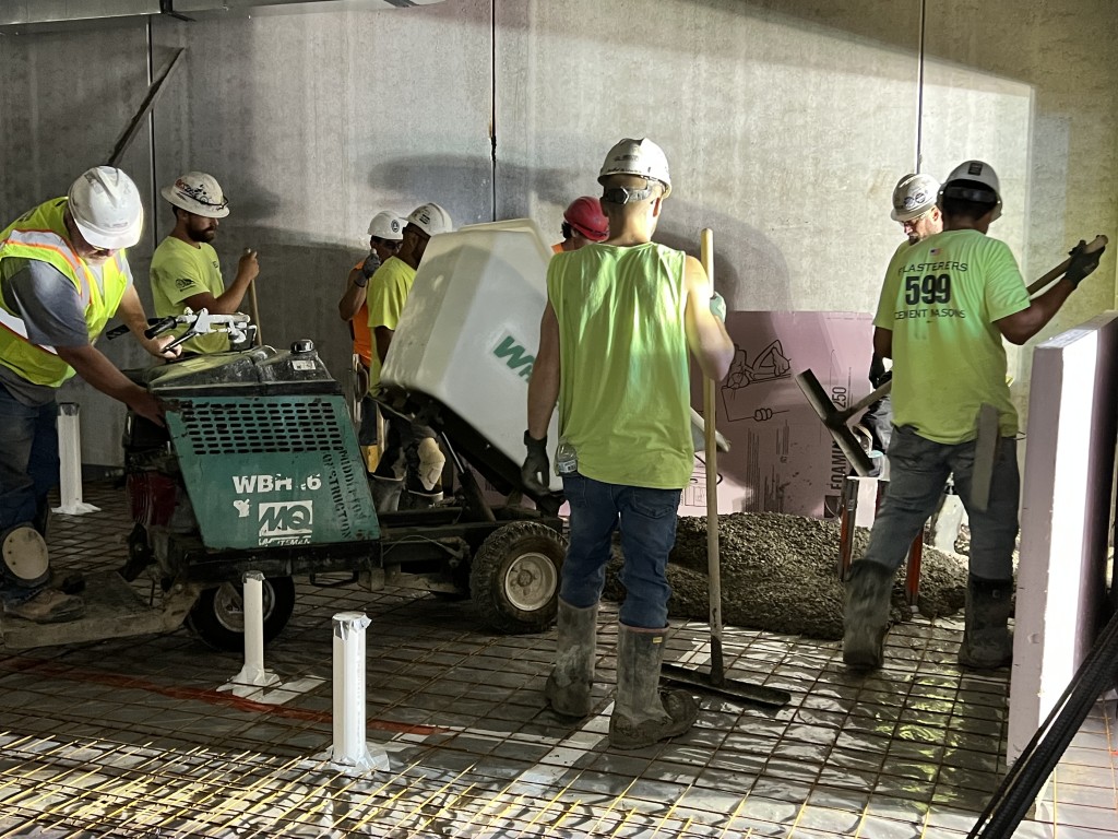8-31-22: Pouring concrete in the new plant restroom