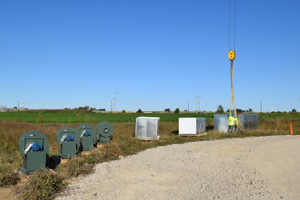 9-22-22: Several new pieces of HVAC equipment await being lifted to the roof