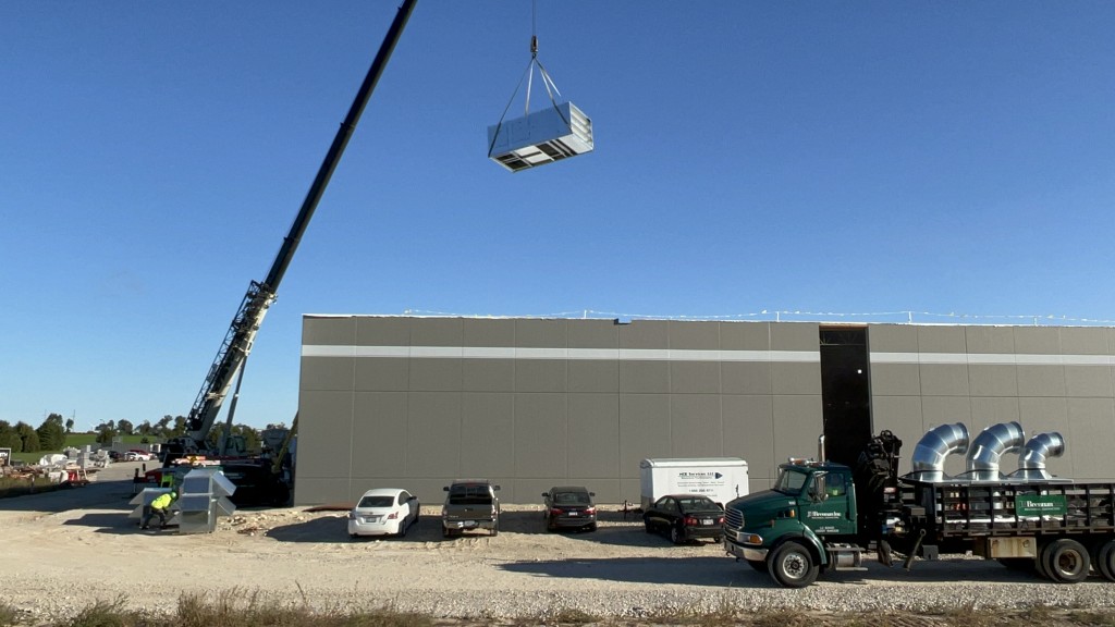9-22-22: HVAC equipment is crane-lifted to the rooftop