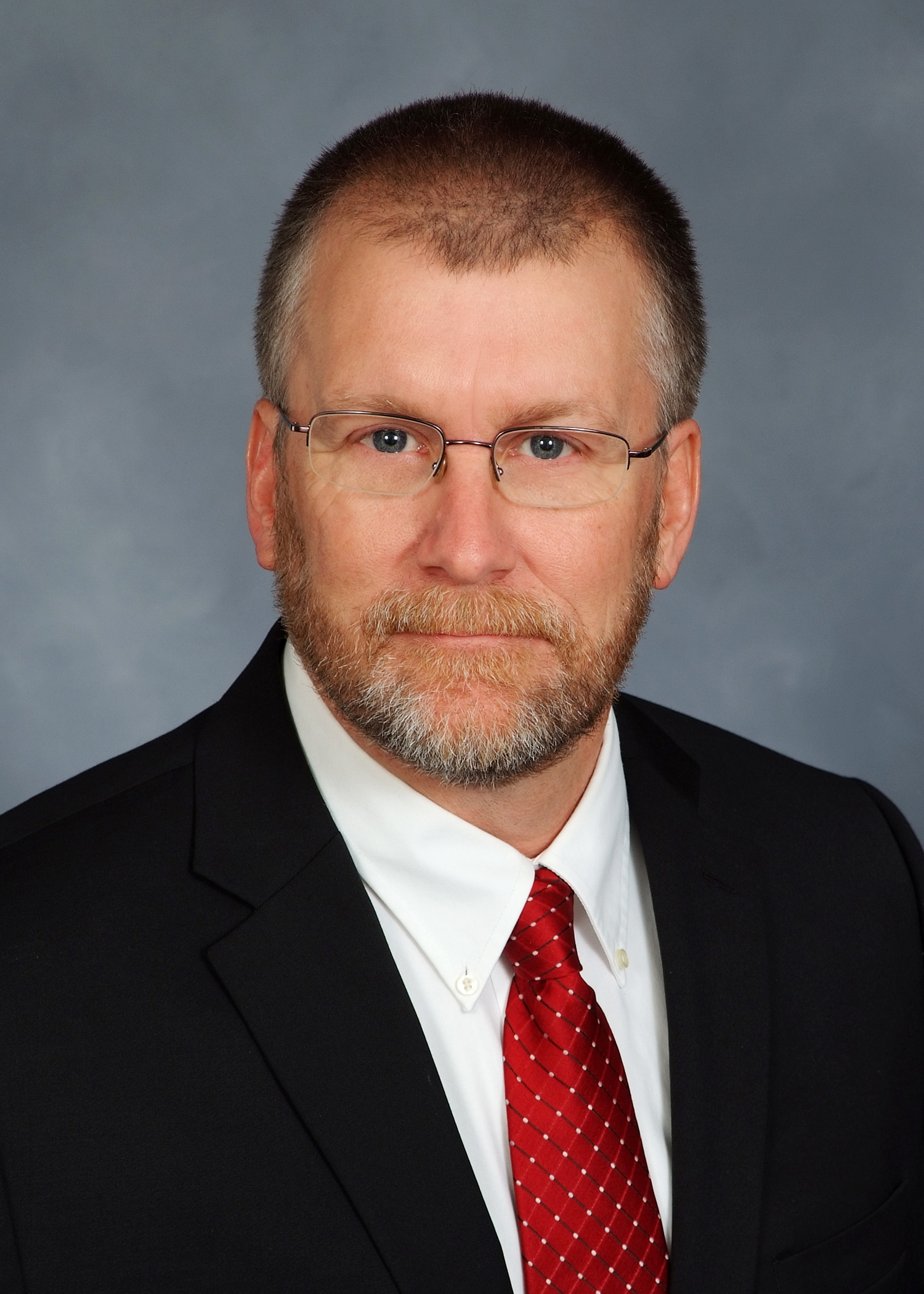 Headshot of Kondex President Keith Johnson in a suit and tie