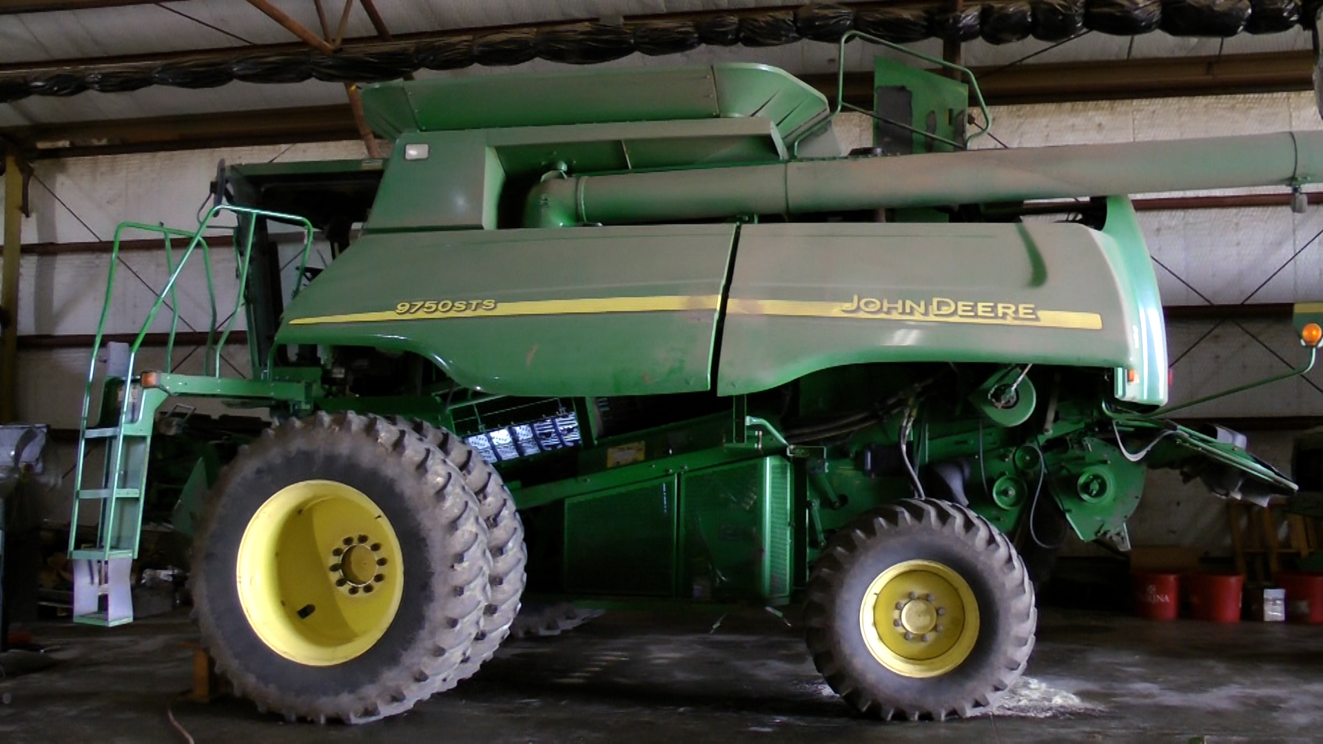 John Deere combine in shop